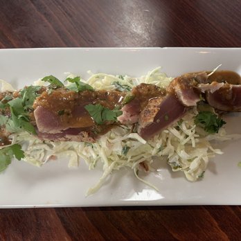 Rumba - Tuna over coleslaw and "yummy" dressing - Caribbean Near Me - Hampton Bays, New York Rumba - Tuna over coleslaw and "yummy" dressing - Caribbean Near Me - Hampton Bays, New York