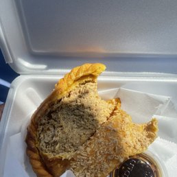 Never seen empanada looking like this, I took a bit and spat it out instantly. Idk what this is. Never seen empanada looking like this, I took a bit and spat it out instantly. Idk what this is.