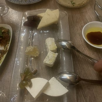 Zaytinya - Cheese plate, feta with honeycomb in the middle was the best - Greek Near Me - Washington, DC, District of Columbia