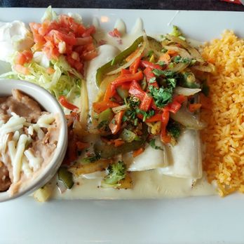 Flaming Margaritas - Vegetable enchiladas with side of rice and beans - Mexican Near Me - Branson, Missouri Flaming Margaritas - Vegetable enchiladas with side of rice and beans - Mexican Near Me - Branson, Missouri