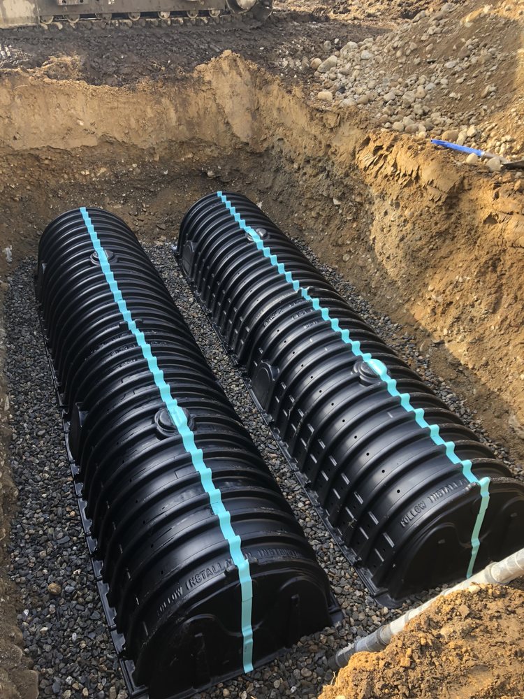 Slide of EmRay Excavating