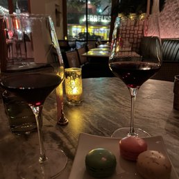 macaroons and a glass of wine macaroons and a glass of wine