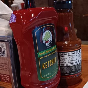 Winking Lizard - a ketchup container and a bottle of ketchup - American Near Me - Independence, Ohio