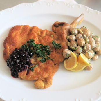 Frenchette - Pork schnitzel, German potatoes, huckleberry preserve - excellent (much bigger than it looks in the pic) - Brasseries Near Me - New York, New York