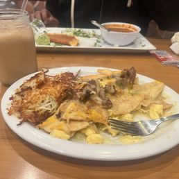 Asada Chilaquiles Plate, Quesabirria Tacos, and Vanilla Iced Coffee Asada Chilaquiles Plate, Quesabirria Tacos, and Vanilla Iced Coffee