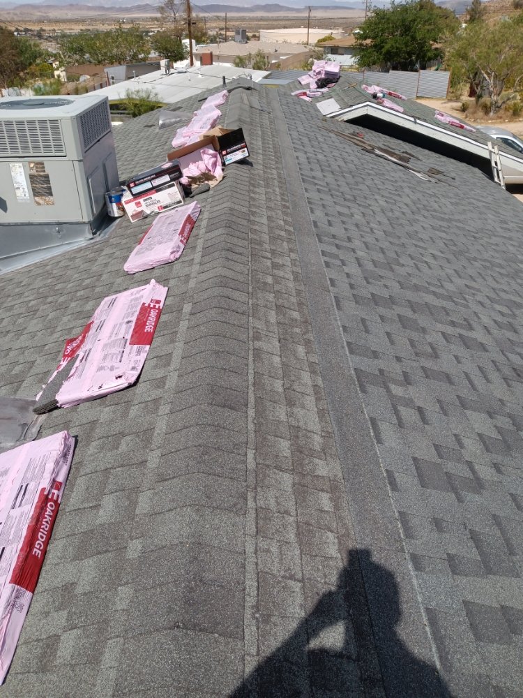 Slide of Moses Roofing