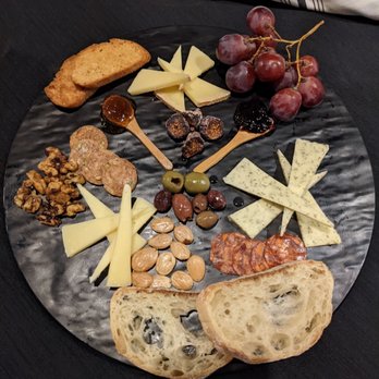 Catering by Sky Armory - a platter of cheese, crackers, grapes, nuts, and olives - Caterers Near Me - Syracuse, New York