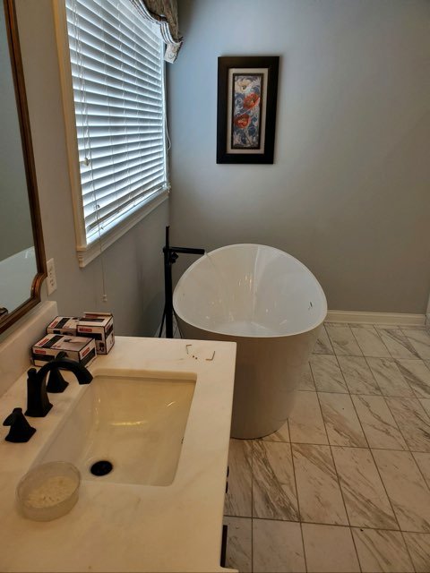 Slide of Lew's Plumbing and Drain Cleaning