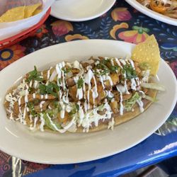 La Catracha  - Also don't remember the name. Similar to a tostada type dish but with a thick soft corn tortilla type thing.