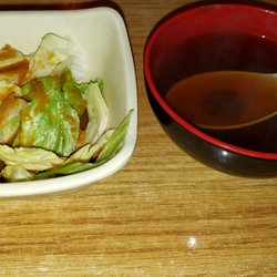 YAMATO JAPANESE STEAK HOUSE - Miso soup with a salad with ginger dressing.