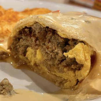 Paul's Breakfast House - Hangover Hero (w/ queso) -- Breakfast Burrito - Breakfast & Brunch Near Me - Branson, Missouri Paul's Breakfast House - Hangover Hero (w/ queso) -- Breakfast Burrito - Breakfast & Brunch Near Me - Branson, Missouri