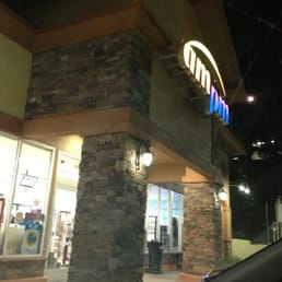 the outside of a store at night the outside of a store at night