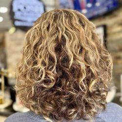 My curly hair after Haircut I absolutely love it.