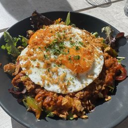 Pulled pork hash on grreens