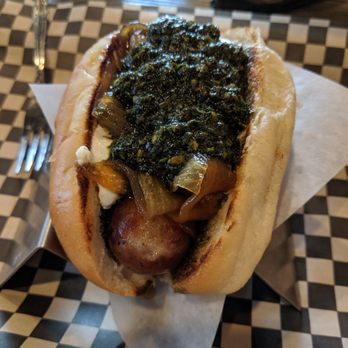 Bangers & Brews Eugene - Classic banger with chimmichurri, grilled onions, and cream cheese. - German Near Me - Eugene, Oregon