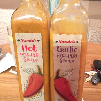 Nando's Peri-Peri - Will be buying these to keep at home! Especially LOVE the garlic one. - Portuguese Near Me - Ashburn, Virginia Nando's Peri-Peri - Will be buying these to keep at home! Especially LOVE the garlic one. - Portuguese Near Me - Ashburn, Virginia