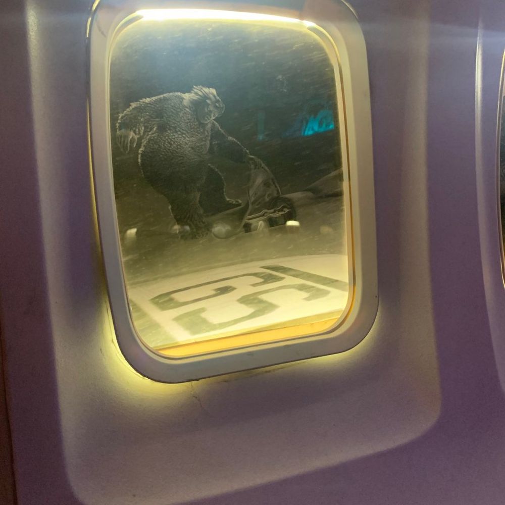 PS Air - Gorilla on the wing scene from the Twilight Zone picture in the airplane window - Cocktail Bars Near Me - Palm Springs, California PS Air - Gorilla on the wing scene from the Twilight Zone picture in the airplane window - Cocktail Bars Near Me - Palm Springs, California