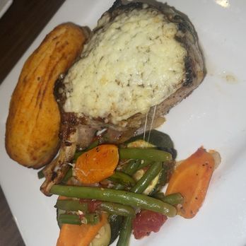 Spiro's Restaurant - Stuffed Pork Chop w/twice baked potato & mixed veggies - Greek Near Me - Saint Charles, Missouri