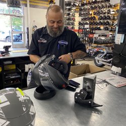 Cycle Gear - Brian installing my new headset into my helmet, no extra charge.