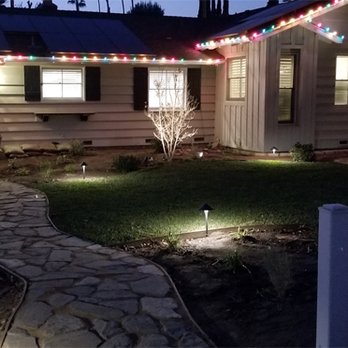 Green Grass Landscaping - New flagstone walkway and landscape lighting - Landscaping Near Me