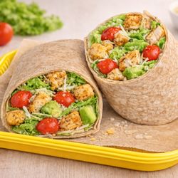 Salad Nation - Crisp romaine tossed in creamy Caesar dressing, layered with parmesan and crunchy croutons, all wrapped in a whole wheat tortilla.