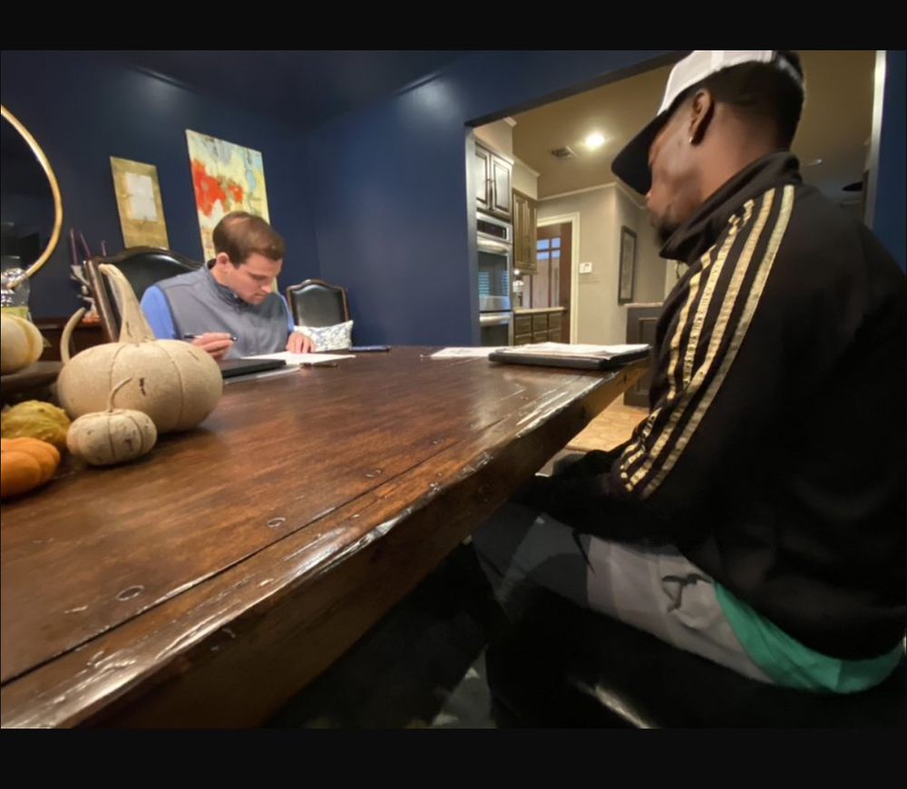 Slide of Ken's Roofing and Construction