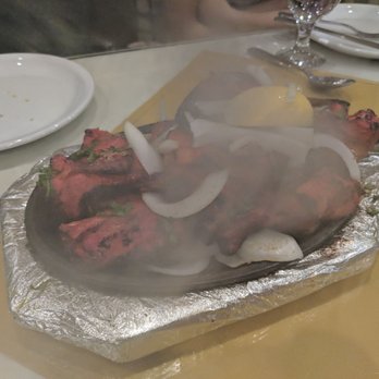 Nirvana Indian Cuisine - Sizzling tandoori chicken - Indian Near Me - Arcadia, California Nirvana Indian Cuisine - Sizzling tandoori chicken - Indian Near Me - Arcadia, California