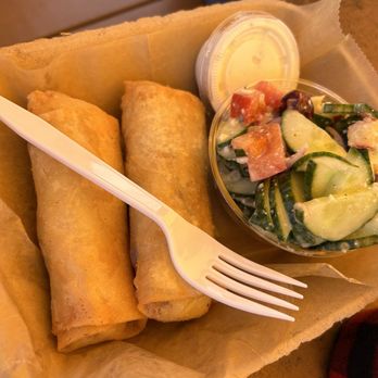 Chicken Coop - Mashed potato egg rolls and cucumber peach salad - Food Trucks Near Me - Sevierville, Tennessee