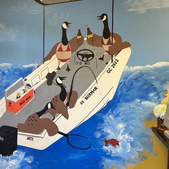 Beer Man - a boat full of dogs on the water - Beer, Wine & Spirits Near Me - Goose Creek, South Carolina