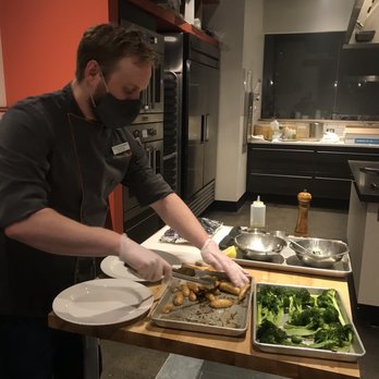 Uncorked Kitchen & Wine Bar - Our chef instructor demonstrating plating - Venues & Event Spaces Near Me - Centennial, Colorado Uncorked Kitchen & Wine Bar - Our chef instructor demonstrating plating - Venues & Event Spaces Near Me - Centennial, Colorado