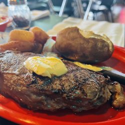 Tolly's Gastropub - Thursday special $12.99 NY strip and baked potato