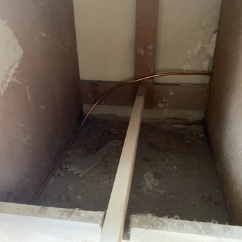 CV Plumbing - Hole drilled through back of shelf then out baseboard - Plumbing Near Me CV Plumbing - Hole drilled through back of shelf then out baseboard - Plumbing Near Me