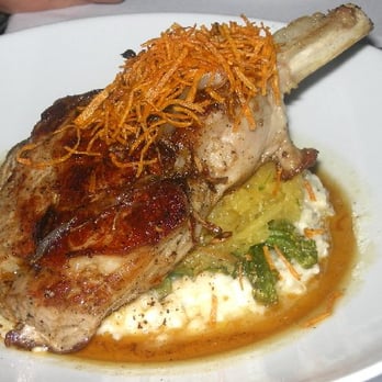 Chandler's - Bone-in veal chop with parmesan-peppercorn risotto and foie-gras beurre compose - New American Near Me - Petoskey, Michigan