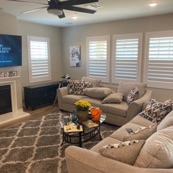 Infinity Window Coverings - Living room shutters.