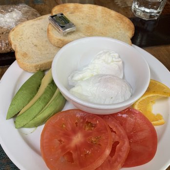 June Bug Cafe - California Breakfast: 2 poached eggs, sourdough, avocado, tomato. So so good. - New American Near Me - Midpines, California June Bug Cafe - California Breakfast: 2 poached eggs, sourdough, avocado, tomato. So so good. - New American Near Me - Midpines, California