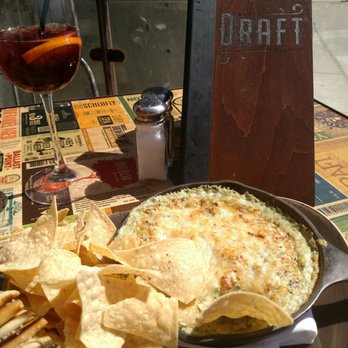Draft - Fabulous artichoke dip!!! Served with warm pita slices and tortilla chips. - American Near Me - San Diego, California
