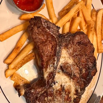 Saltgrass Steak House - This is not cut by me, it came this way missing half the steak. Almost looks cut away to serve someone else? - Steakhouses Near Me - Parker, Colorado