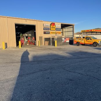 Love's Travel Stop - a yellow car parked in front of a building - Gas Stations Near Me - Tehachapi, California