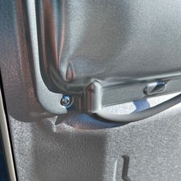One of two dents over the control box on the back of a new $3,000 LG refrigerator that involved three days of fiasco in getting delivered