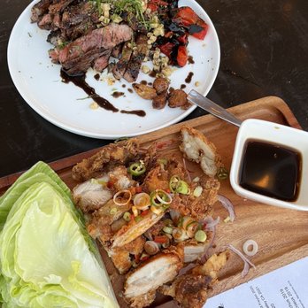 The Magpie - Spice rubbed ribeye and a chicken dish. - New American Near Me - San Antonio, Texas The Magpie - Spice rubbed ribeye and a chicken dish. - New American Near Me - San Antonio, Texas