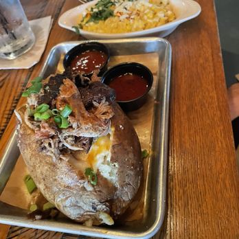 Marty B's - Pulled pork topped baked potato with side of elote! - Tex-Mex Near Me - Bartonville, Texas Marty B's - Pulled pork topped baked potato with side of elote! - Tex-Mex Near Me - Bartonville, Texas