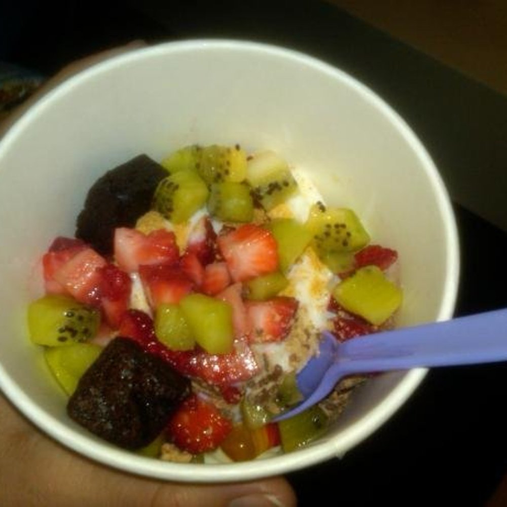 Nubi Yogurt - strawberries, kiwis, brownie bites and some candy on original tart. - Ice Cream & Frozen Yogurt Near Me - Redlands, California Nubi Yogurt - strawberries, kiwis, brownie bites and some candy on original tart. - Ice Cream & Frozen Yogurt Near Me - Redlands, California