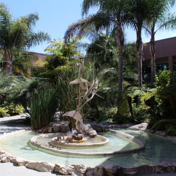 FreedomVoice - Dolphin fountain in the courtyard. Easy environment to come to work happy and ready to help. - Telecommunications Near Me - Encinitas, California