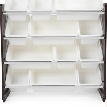 once upon a child - A multi-tiered storage rack made of white plastic with several shelves, each containing empty bins. The rack is supported by a dark-colored frame and is designed for organizing or displaying items. The background is plain white, and the image appears to be a product listing or catalog photo. - Children's Clothing Near Me - Paramus, New Jersey