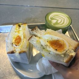 Egg salad sandwich and matcha latte Egg salad sandwich and matcha latte