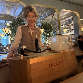 Bourbon Steak - Marcella with the smoke machine. - Steakhouses Near Me - New York, New York