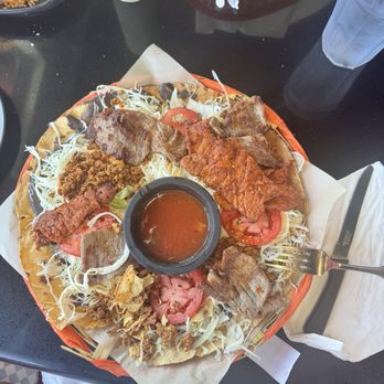 Culturas Hidalgo & Oaxaca Restaurant - 4 different kinds of meat, cheese, tomato, avocado, & cabbage. The sauce--just right - Mexican Near Me - Salinas, California