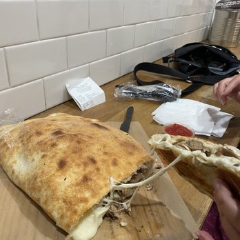 ZeroZero39 Pizzeria - Sausage and mushroom calzone - Pizza Near Me - Huntington Beach, California ZeroZero39 Pizzeria - Sausage and mushroom calzone - Pizza Near Me - Huntington Beach, California