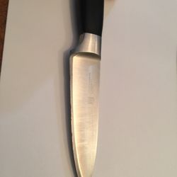 Photo of Mike & Son Sharpening Service - Brooklyn, NY, US. Henckel's paring knife is jagged now.