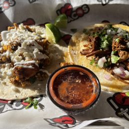 Papa & Chorizo Egg Taco (left) and Brisket Taco Papa & Chorizo Egg Taco (left) and Brisket Taco